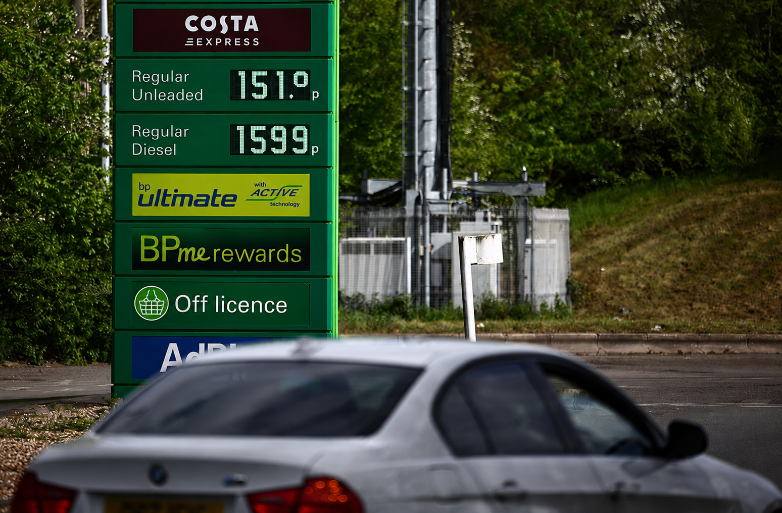 Petrol Prices UK Today showing a UK driver filling up at a petrol station as fuel prices rise above 150p per litre.