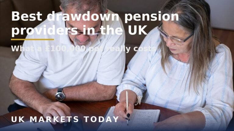 Older couple reviewing pension and finance papers at a table