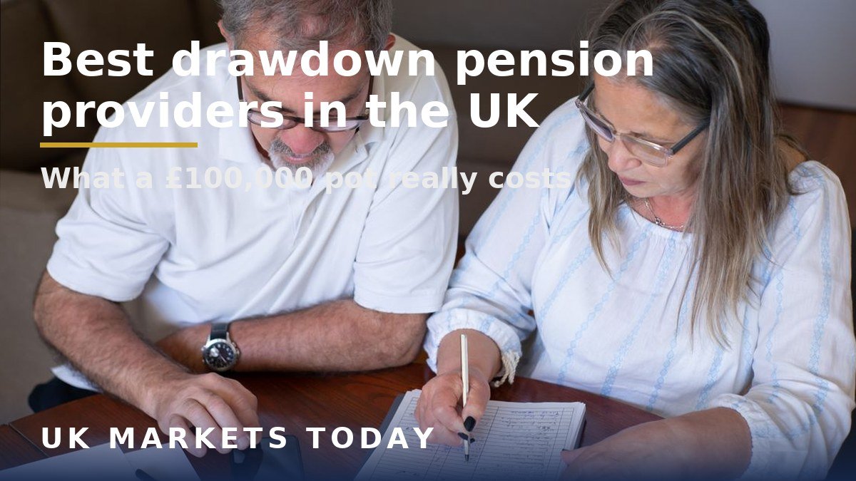 Older couple reviewing pension and finance papers at a table