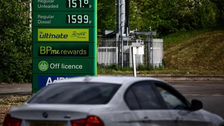 Petrol Prices UK Today showing a UK driver filling up at a petrol station as fuel prices rise above 150p per litre.