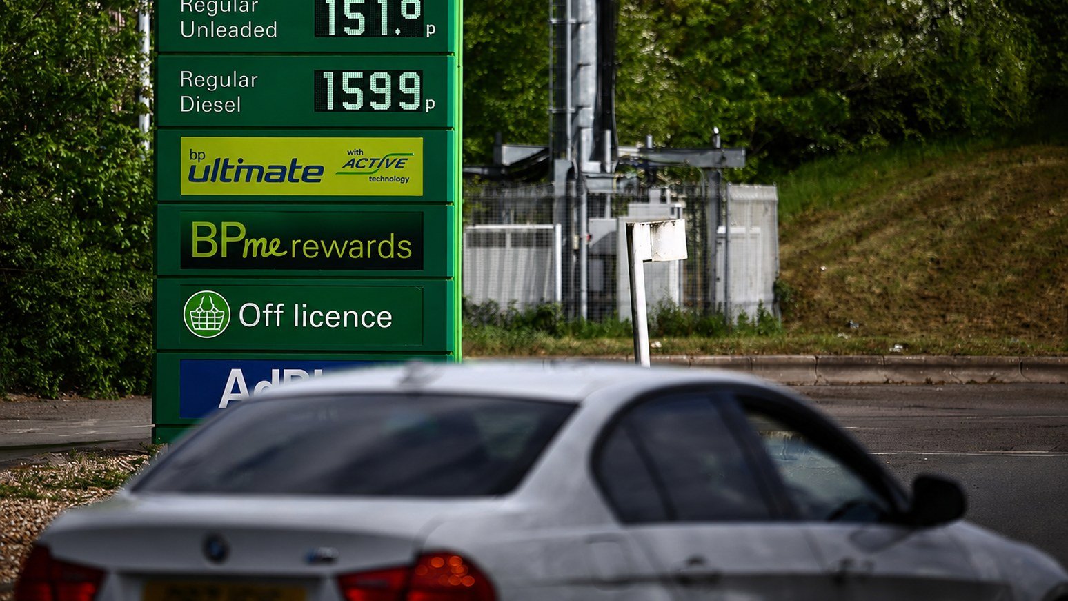Petrol Prices UK Today showing a UK driver filling up at a petrol station as fuel prices rise above 150p per litre.