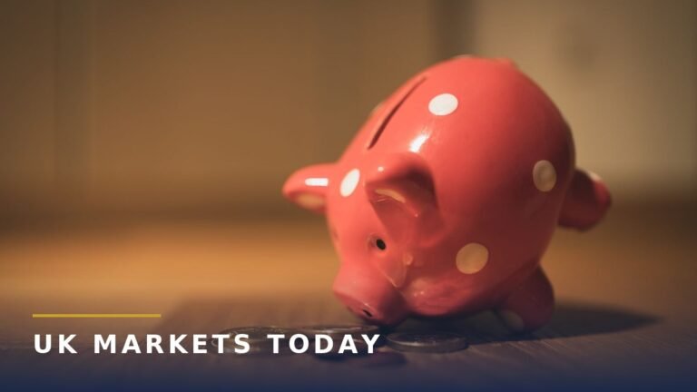 Piggy bank beside coins