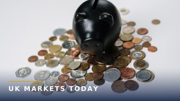 A black piggy bank surrounded by coins, for a guide to transferring cash ISAs to a better rate
